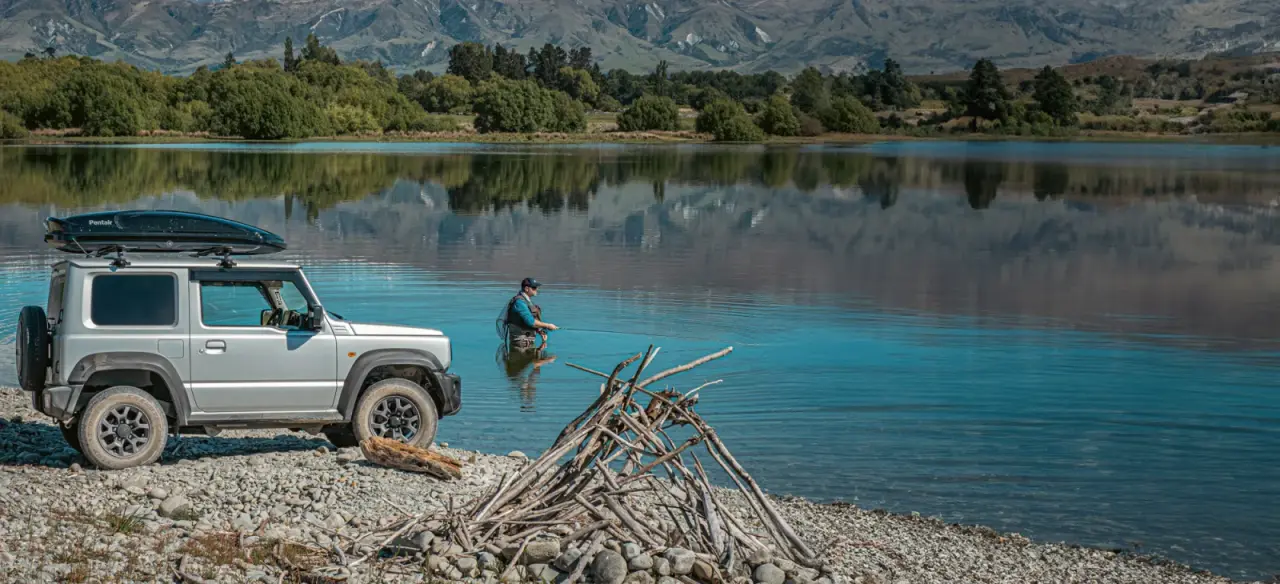 Suzuki Jimny rental vehicle in adventure context. – Jimny Rentals.